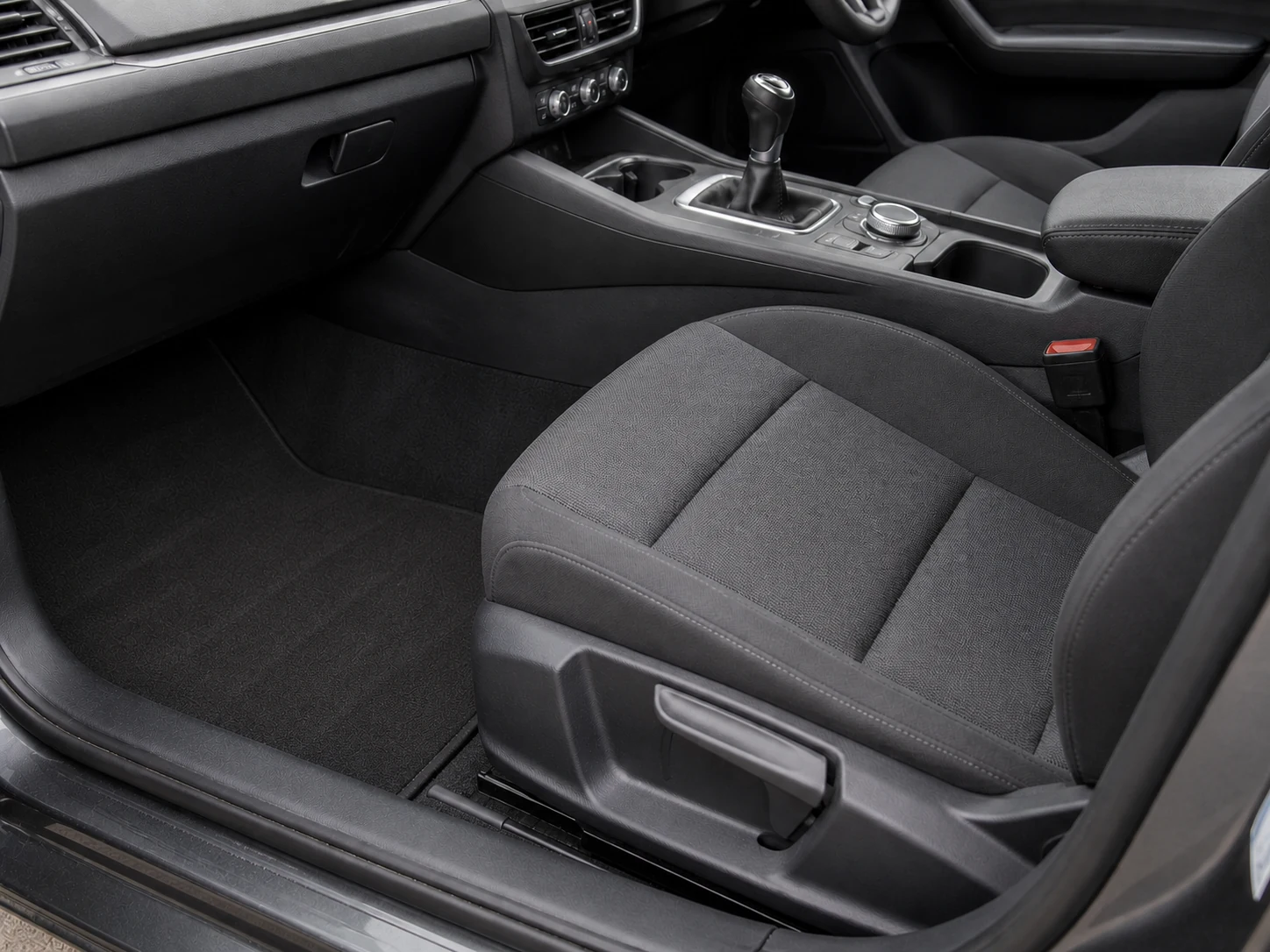 Demonstration image of the same car interior after cleaning